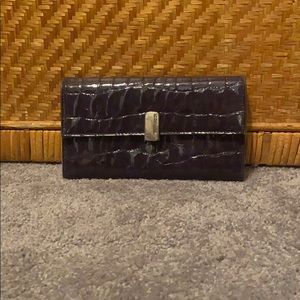 Gently used purple Liz Claiborne Tri-fold wallet